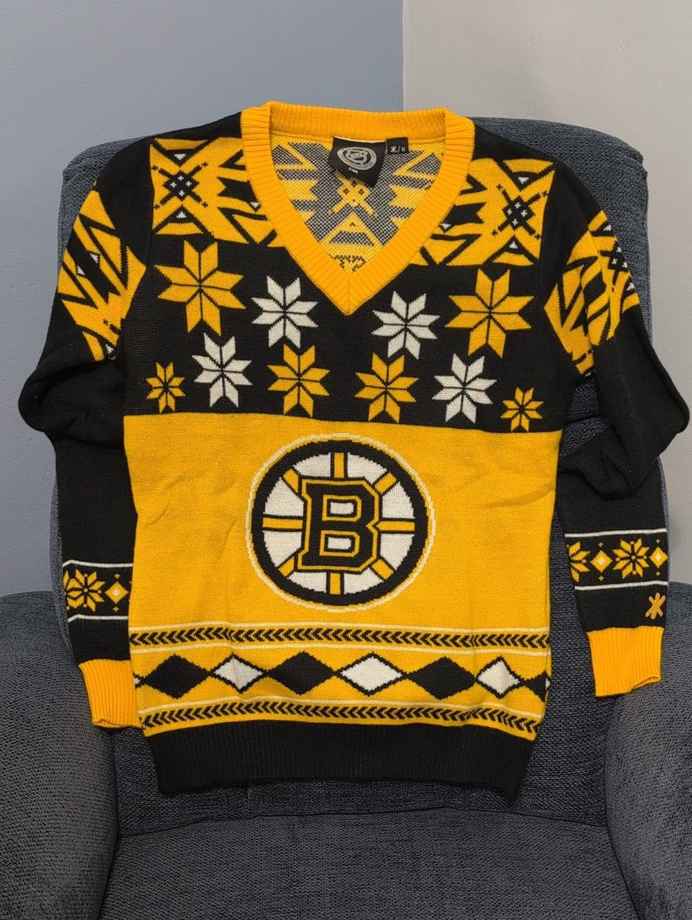 NHL Black and Gold V-Neck Team Sweater